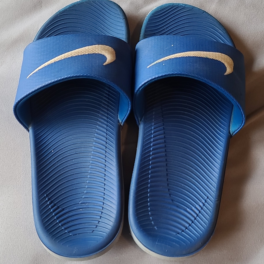 Youth Nike slip ons